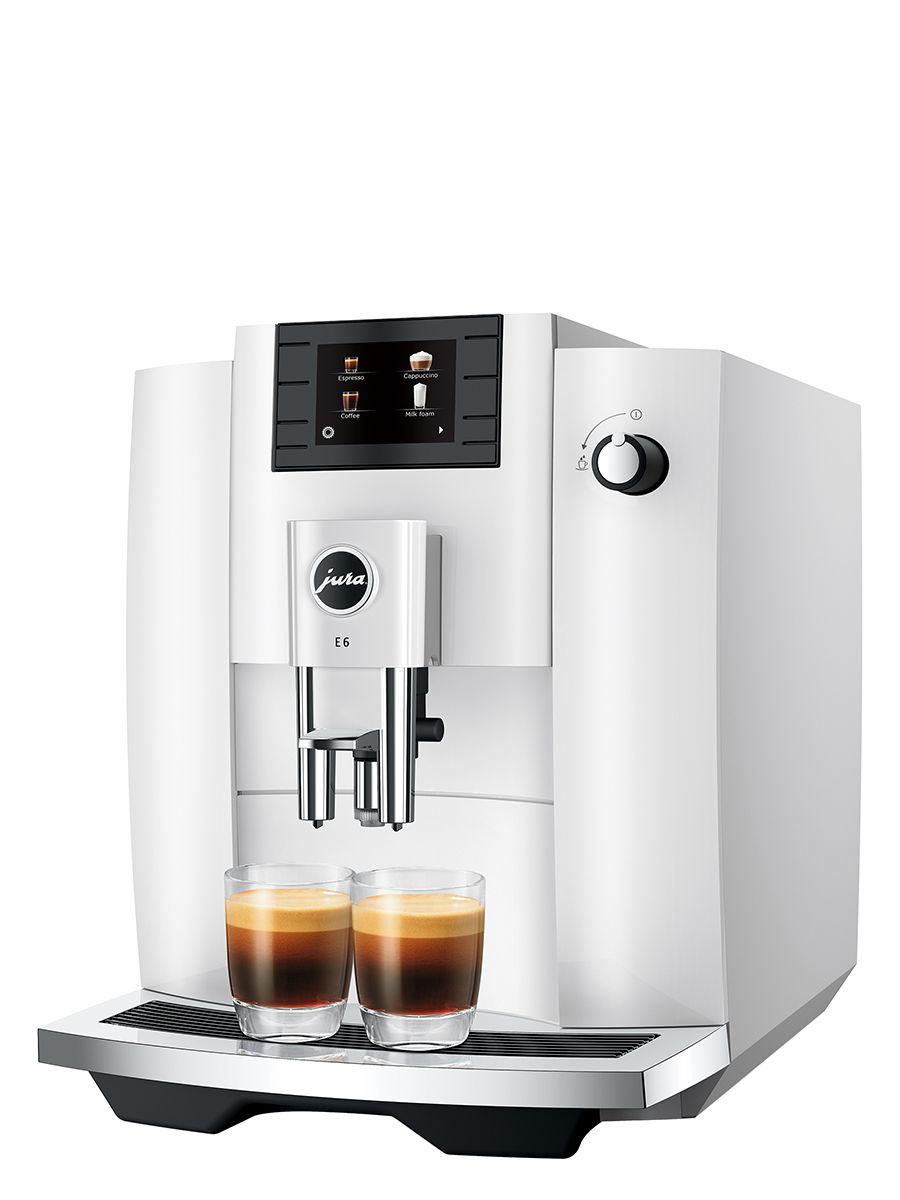Right side angle of E6 Piano White displaying the display screen and two dispensed espressos