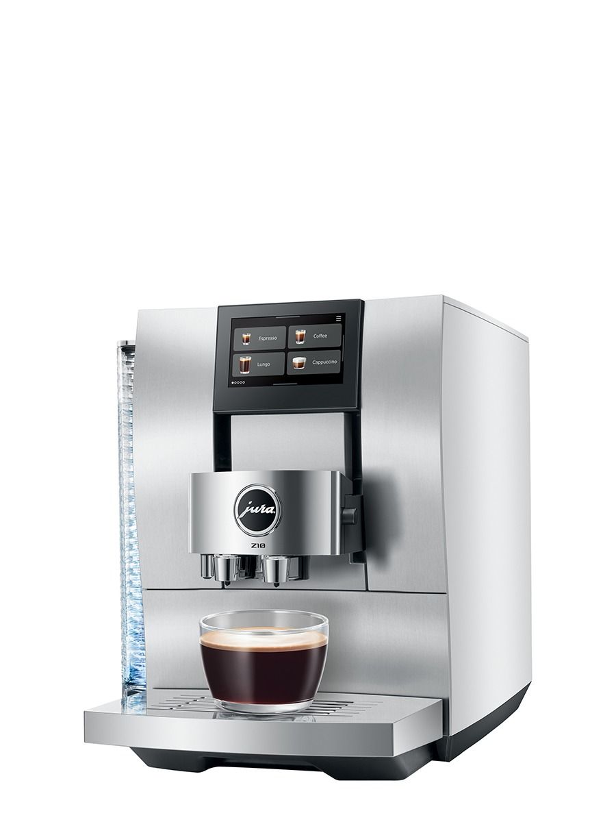 JURA Z10 Aluminum White coffee machine with freshly brewed coffee in a glass cup