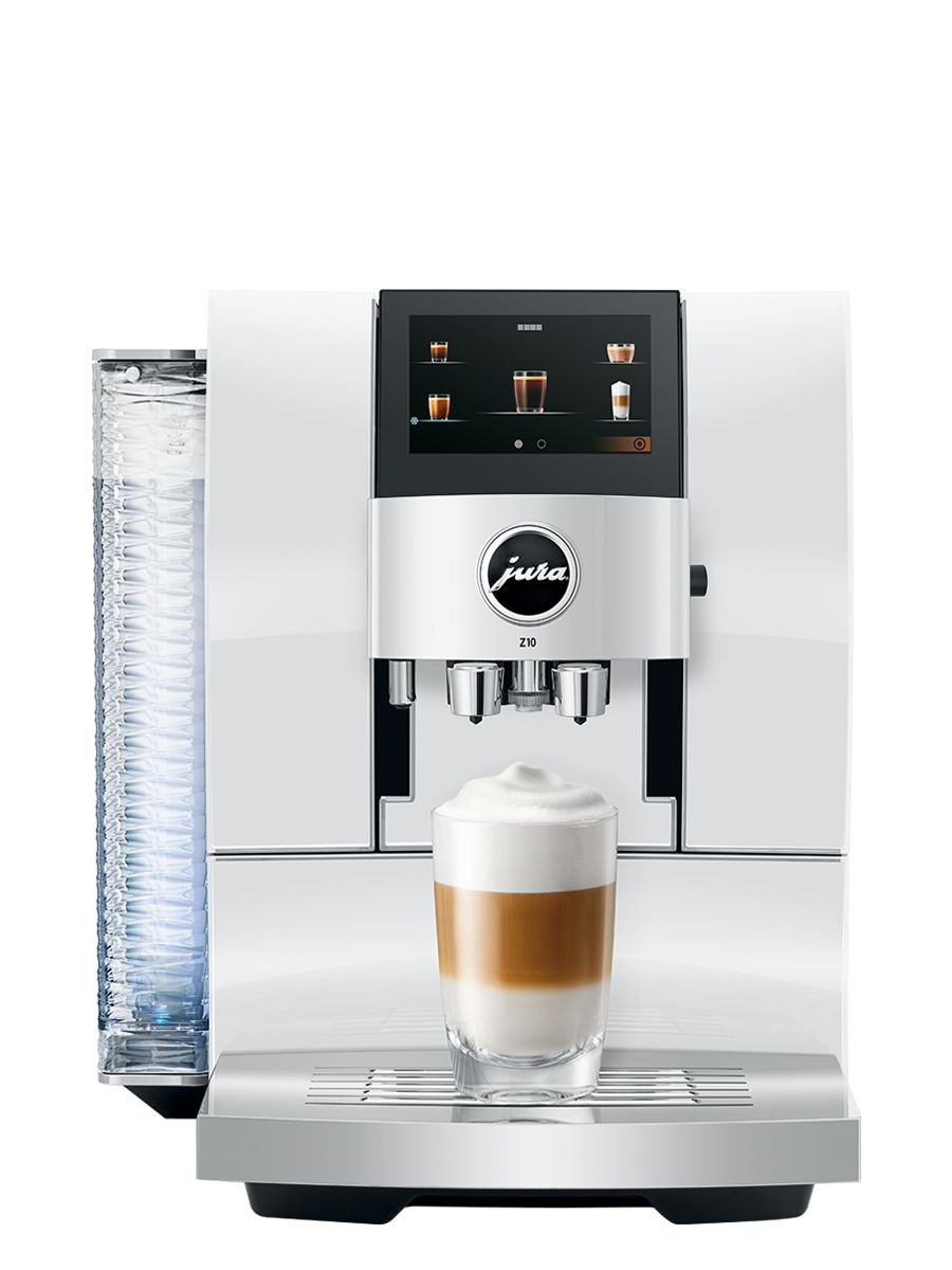 Front view of Z10 Diamond White including touchscreen display, coffee spouts, drip tray, with a Latte Macchiato in a glass cup