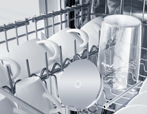 View of Glass Milk Container in top shelf of dishwasher