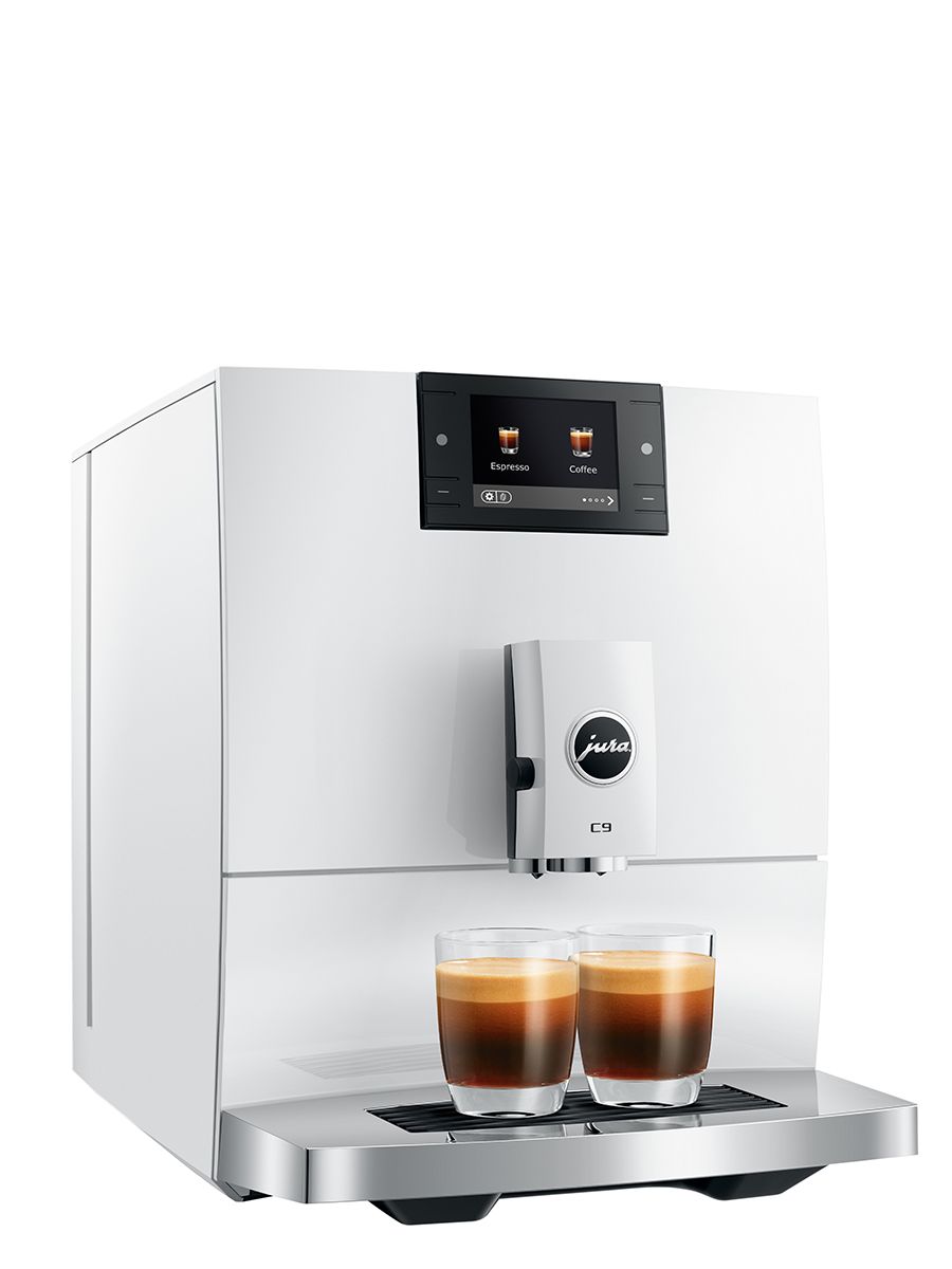 Angled front view of the JURA C9 Piano White coffee machine dispensing two espresso drinks into two glass cups.
