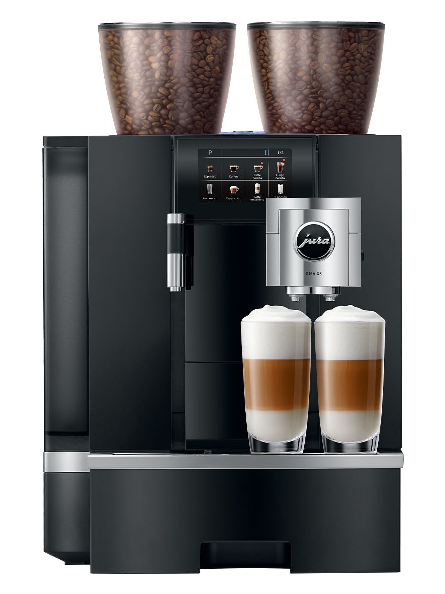 Front view of GIGA X8 including touchscreen, coffee spouts, drip tray, with a two Latte Macchiatos in a glass cup