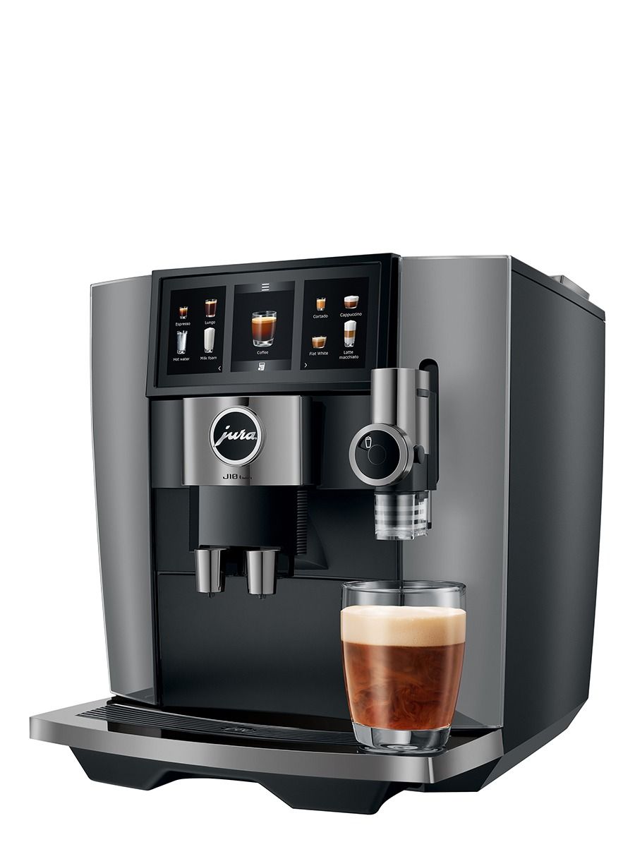 JURA J10 twin Diamond Onyx coffee machine preparing a milk specialty drink