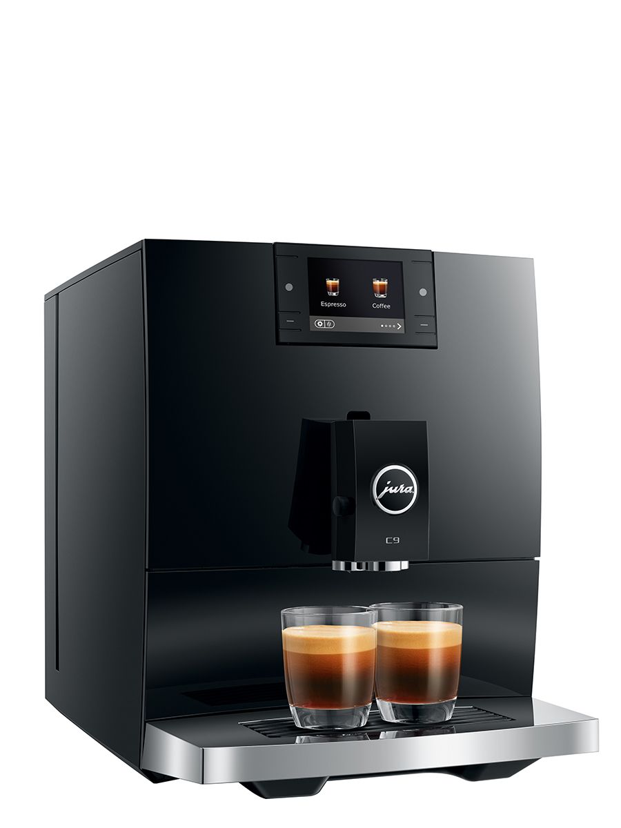 Angled front view of the JURA C9 Piano Black coffee machine dispensing two espresso drinks into glass cups.
