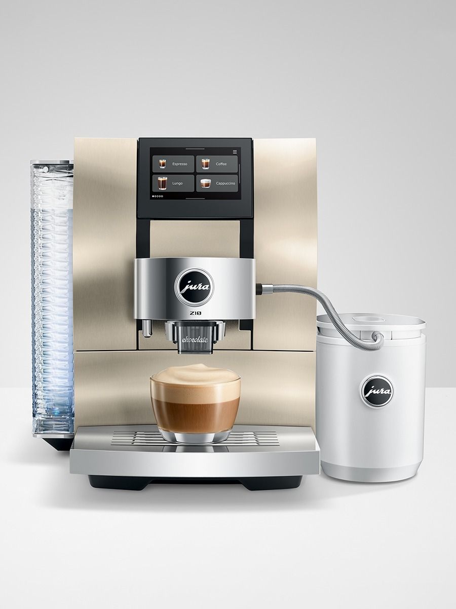 JURA Z10 Aluminum Champagne coffee machine preparing a chocolate coffee drink with a milk container attached