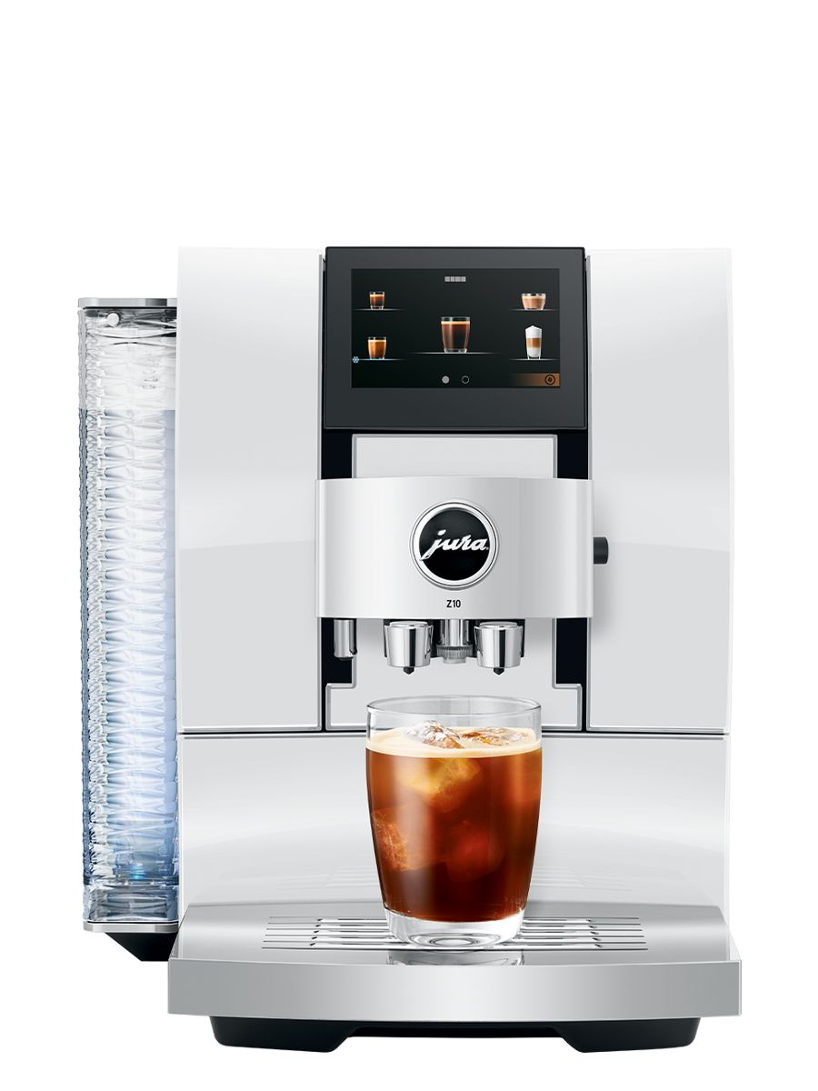 Front view of Z10 Diamond White including touchscreen display, coffee spouts, drip tray, with a cold brew coffee in a glass cup