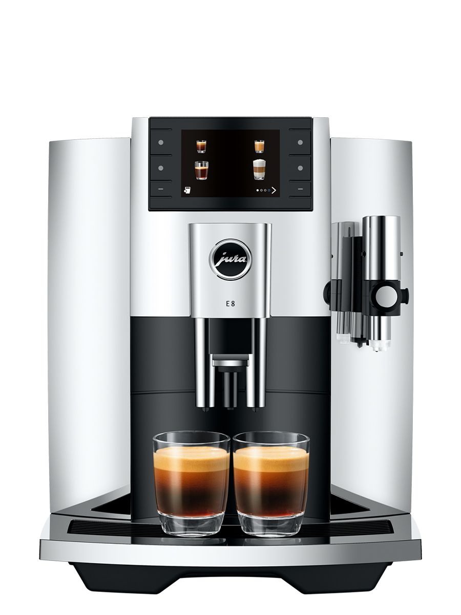 Front view of Jura E8 Chrome NAC espresso machine dispensing two shots of espresso into glass cups, with color display