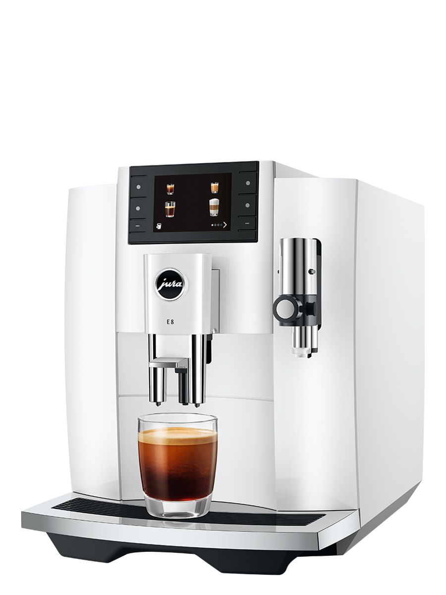 Side view of Jura E8 Piano White NAC espresso machine with coffee dispensing spout and cup beneath, showcasing its sleek black exterior and espresso preparation capability.